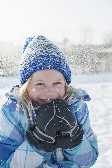 portrait of smiling girl in winter Portrait of girl shivering in winter