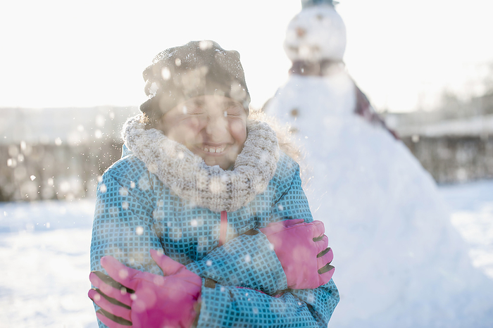 girl having fun in snow Girl shivering in winter
