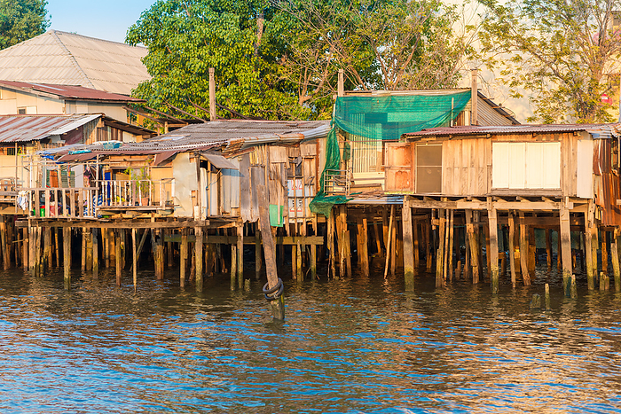 Common people living in stilt houses at the Chao Phraya river Common people living in stilt houses at the Chao Phraya river, by Zoonar Stefan Laws