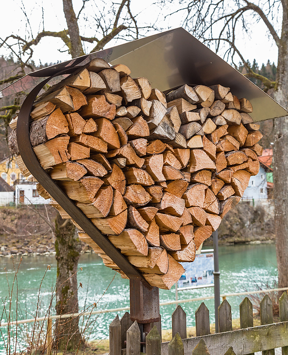 Heart made of logs with metal roof Heart made of logs with metal roof, by Zoonar Robert Jank