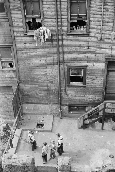 urban, slums, Pittsburgh, buildings, historical, High Angle View of Children in Urban Backyard, Slums, Pittsburgh, Pennsylvania, USA, Arthur Rothstein for Farm Security Administration, July 1938 Editorial Use Only