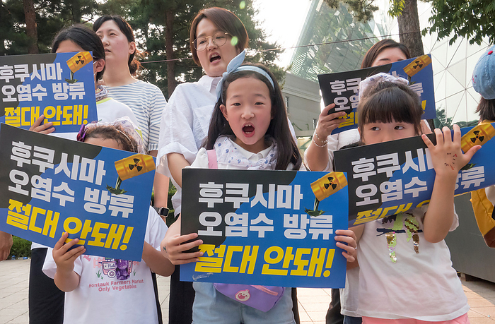 Protest in Seoul against Japan s plan to release radioactive water from the wrecked Fukushima nuclear power plant in to the sea Protest against Japan s plan to release radioactive water, June 24, 2023 : South Korean children participate in a protest to oppose Japan s decision to discharge radioactive water from the crippled Fukushima nuclear power plant into the sea, in Seoul, South Korera. Protesters condemned South Korean President Yoon Suk Yeol for being a pro Japanese autocrat and called for him to prepare measures to stop Japan s plan to release radioactive water into the ocean. Pickets read,  Japan s  Discharging of radioactive water from the crippled Fukushima nuclear power plant into the sea, Don t do it  .  Photo by Lee Jae Won AFLO   SOUTH KOREA 