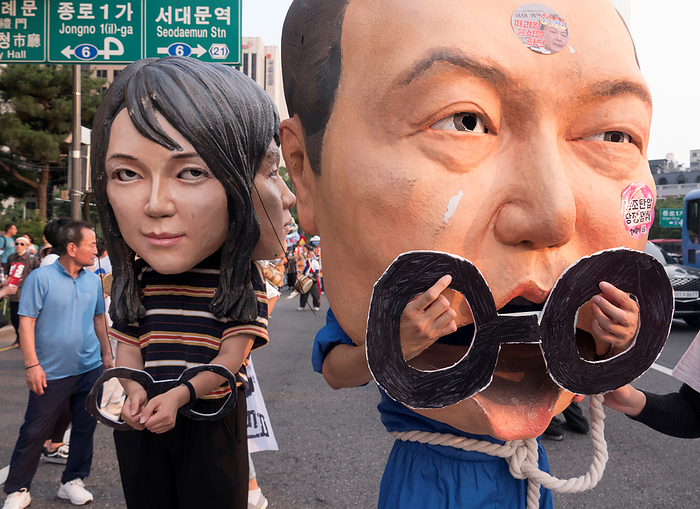 Rally calling for South Korean President Yoon Suk Yeol to prepare measures to stop Japan s decision to discharge radioactive water into the sea Anti Japan and anti Yoon Suk Yeol protest, June 24, 2023 : A protester  R  wearing a mask satirizing South Korean President Yoon Suk Yeol as a criminal and another protester wearing a mask featuring facial plastic surgery of South Korean first lady Kim Keon Hee and satirizing her as another criminal, participate in an anti Japan and anti Yoon Suk Yeol protest march in central Seoul, South Korea. Thousands of protesters at the rally condemned South Korean President Yoon for being a pro Japanese autocrat and called for him to prepare measures to stop Japan s decision to discharge radioactive water from the crippled Fukushima nuclear power plant into the Pacific Ocean.  Photo by Lee Jae Won AFLO   SOUTH KOREA 