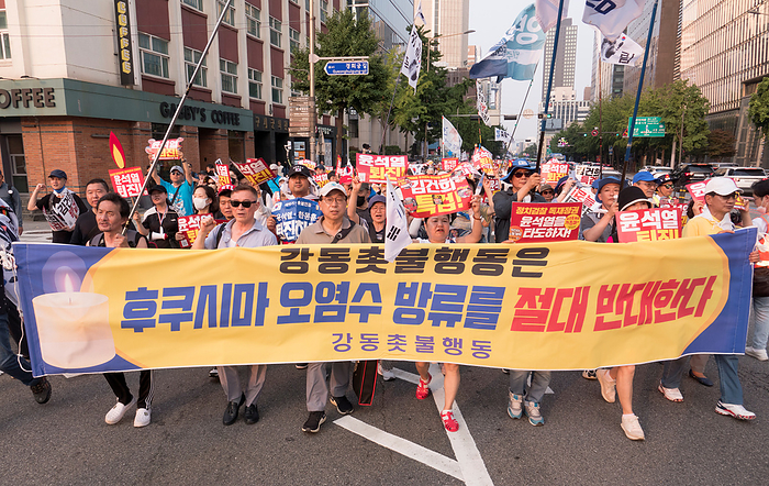 Rally calling for South Korean President Yoon Suk Yeol to prepare measures to stop Japan s decision to discharge radioactive water into the sea Anti Japan and anti Yoon Suk Yeol protest, June 24, 2023 : People march during an anti Japan and anti Yoon Suk Yeol protest in central Seoul, South Korea. Thousands of protesters at the rally condemned South Korean President Yoon for being a pro Japanese autocrat and called for him to prepare measures to stop Japan s decision to discharge radioactive water from the crippled Fukushima nuclear power plant into the Pacific Ocean. Korean characters on the placard read,  We are positively against Japan s plan to discharge radioactive water from the Fukushima nuclear power plant into the sea . Other pickets read,  Yoon Suk Yeol step down  .  Photo by Lee Jae Won AFLO   SOUTH KOREA 