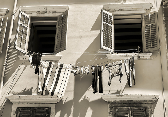 historical building with clothesline in the old town of Rovinj in Croatia historical building with clothesline in the old town of Rovinj in Croatia, by Zoonar Heiko Kueverl