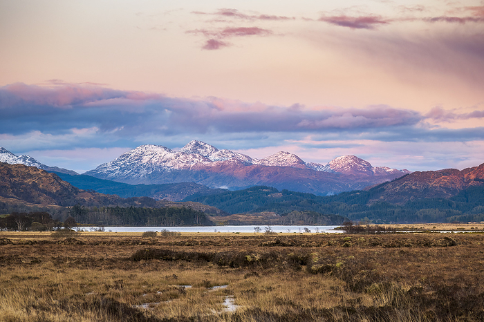 UK, Scotland, Loch Shiel at dusk with mountains in background