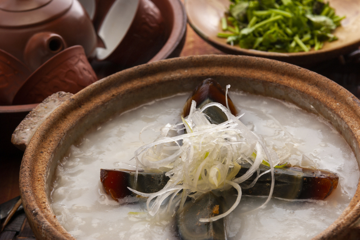 Chinese rice porridge with skinny egg