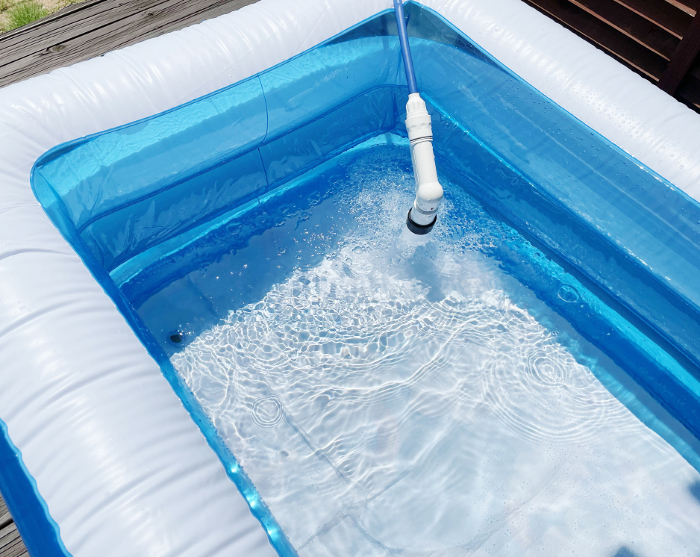 Storing water in a kiddie pool Reflective water surface