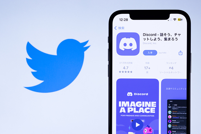 new social network services app Discord app by Discord Inc. is with a Twitter logo in the background seen in Tokyo, Japan, July 10, 2023. Discord is an instant messaging social platform.  Photo by Shingo Tosha AFLO 