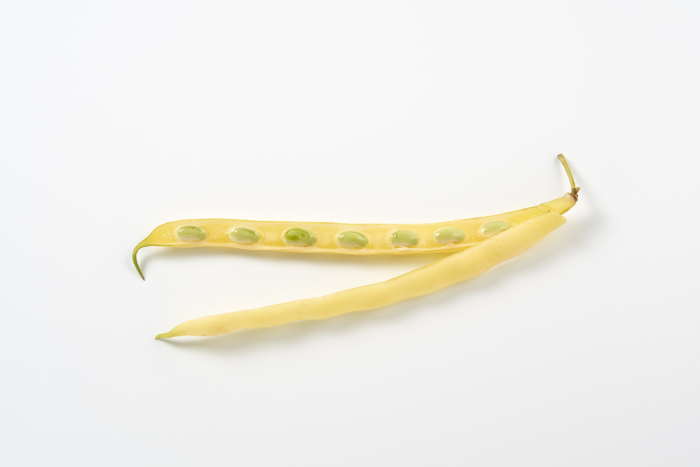 Yellow beans on white background