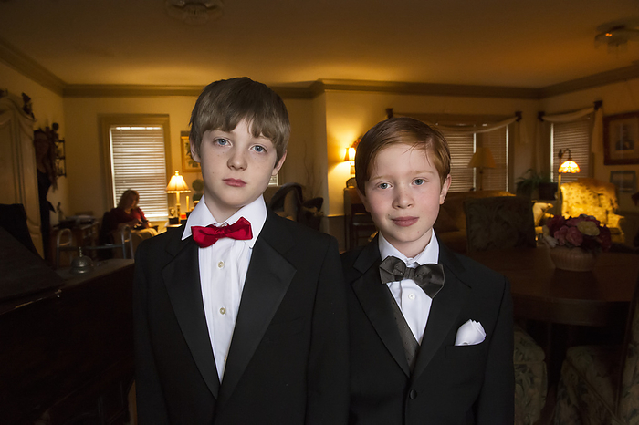 Portrait of two young boys dressed in formal attire; Lincoln, Nebraska, United States of America, by Joel Sartore Photography / Design Pics