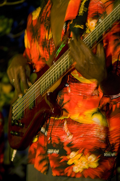Jamaica Guitarist playing an electric guitar at a tropical resort  Montego Bay, Jamaica, West Indies, by Michael Melford   Design Pics