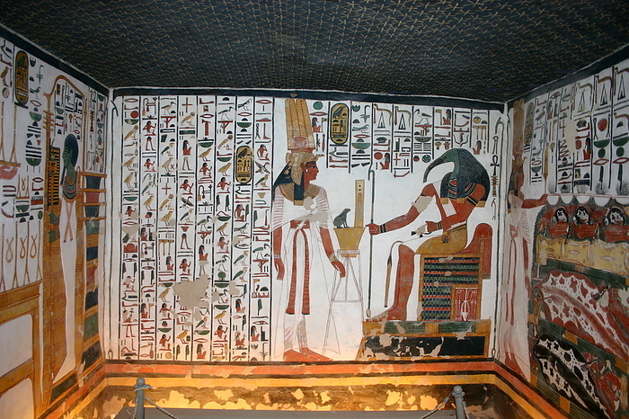 Sign at the entrance to the Tomb of Amun her khepeshef, Valley of the Kings, Luxor, Egypt. Wall Painting depicting, Thoth and Nefertari, inside the tomb  QV66  of Nefertari, Great Wife of Pharaoh Ramesses II, in Egypt s Valley of the Queens. It was discovered by Ernesto Schiaparelli in 1904. It is called the Sistine Chapel of Ancient Egypt. In the Valley of the Queens, Nefertari s tomb once held the mummified body and representative symbolisms of her, like what most Egyptian tombs consisted of. Now, everything had been looted except for two thirds of the 5,200 square feet of wall paintings. ca. 1255 BC