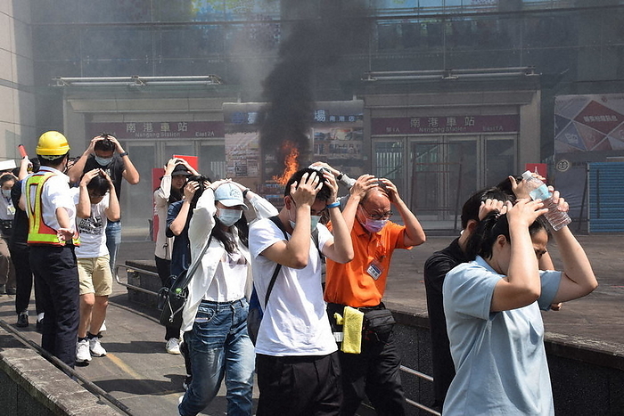 Citizens participating in an exercise simulating a possible invasion by Chinese troops and conducting an evacuation drill. Citizens participate in an exercise simulating a Chinese military invasion and conduct an evacuation drill in Taipei, July 24, 2023, 2:00 p.m. Photo by Lin Te ping