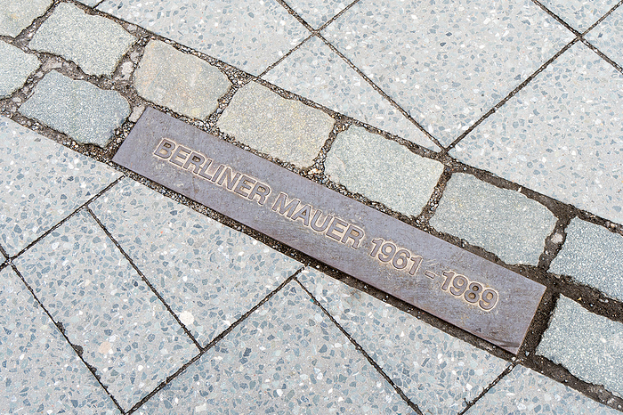 commemorative plaque marking former border Berlin Wall commemorative plaque marking former border Berlin Wall, by Zoonar Axel Bueckert