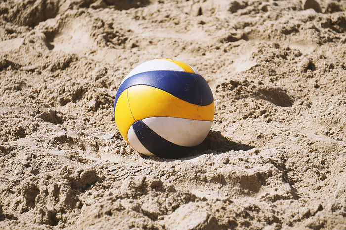 beach volleyball ball in the sand beach volleyball ball in the sand, by Zoonar Axel Bueckert