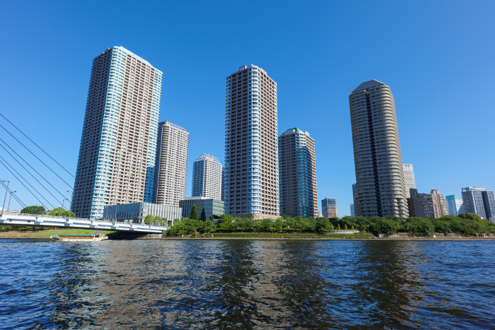 Blue summer sky and high-rise apartments on Tokyo's Tsukuda Island