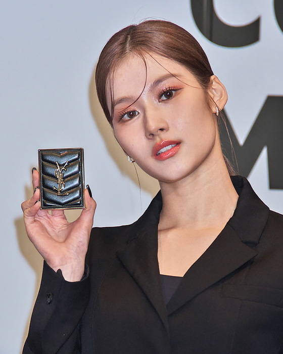 Yves Saint Laurent Beaute launches new eye shadow in Japan Member of Twice, Sana attends the press conference for Yves Saint Laurent Beaute new eye shadow  Couture Mini Clutch  at Tokyo Midtown in Tokyo, Japan on July 29, 2023.