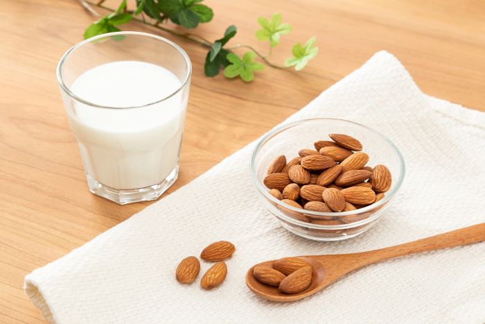 Almonds and milk on the table