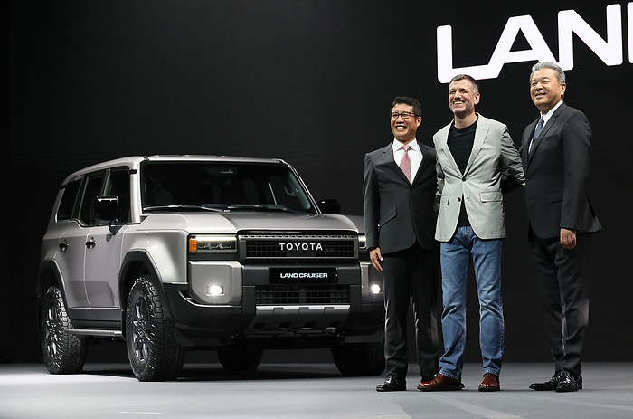 Toyota Motor displays the prototype model of the new Land Cruiser August 2, 2023, Tokyo, Japan   Japanese automobile giant Toyota Motor executive vice president Hiroki Nakajima  R  and chief branding officer Simon Humphries  C  pose for photo as they announce the prototype model of the new  Land Cruiser 250 series  in Tokyo on Wednesday, August 2, 2023. Toyota s heavy duty Land Cruiser which has 2.4 litter gasoline and 2.8 litter diesel models will ship to globally from early next year.   photo by Yoshio Tsunoda AFLO 