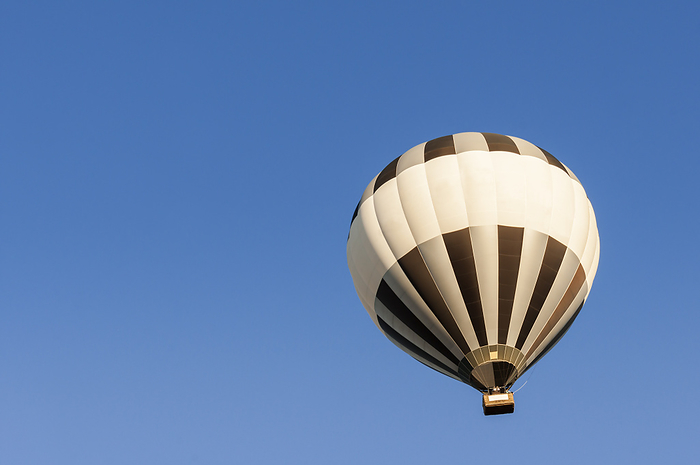 Hot air balloon floating in the air Hot air balloon floating in the air