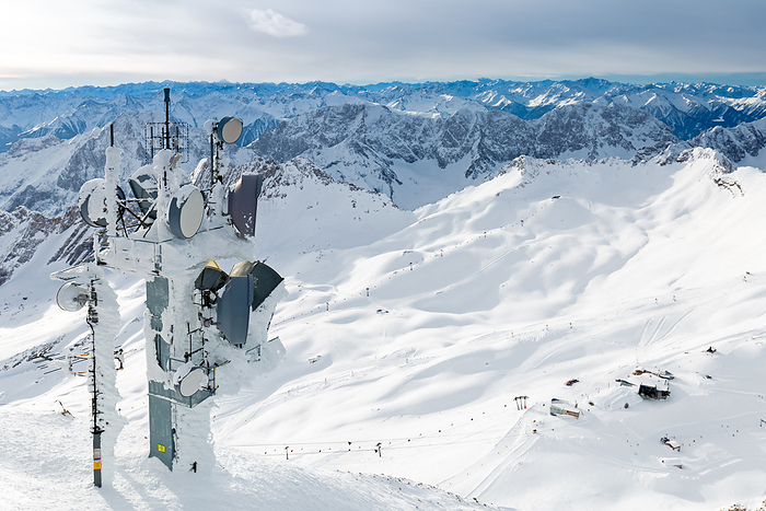 Radio mast on Zugspitze mountain summit in winter Radio mast on Zugspitze mountain summit in winter