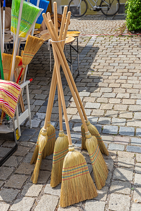 Broom for sale at a market stall Broom for sale at a market stall