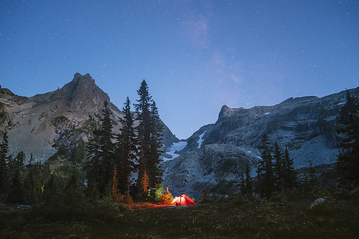 Camping Tent Glowing At Night In The Cascade Mountains
