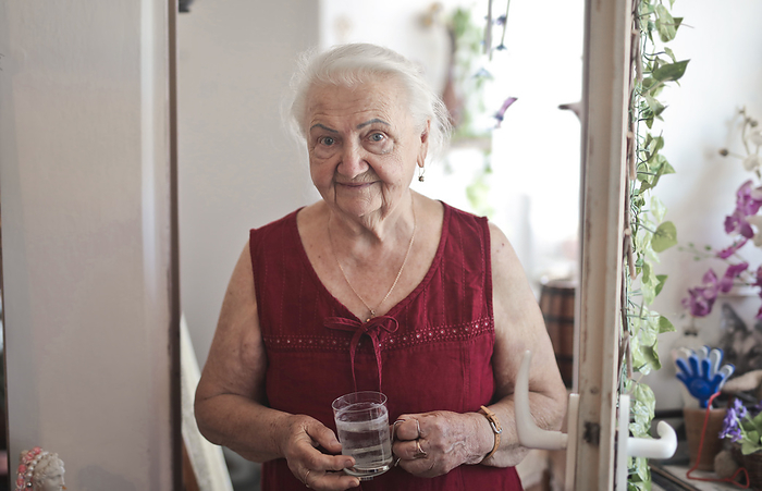 portrait of elderly lady in her home