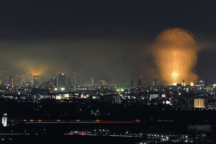 Naniwa Yodogawa Fireworks Festival and Umeda skyscrapers viewed from Kyoto City, Osaka Prefecture
