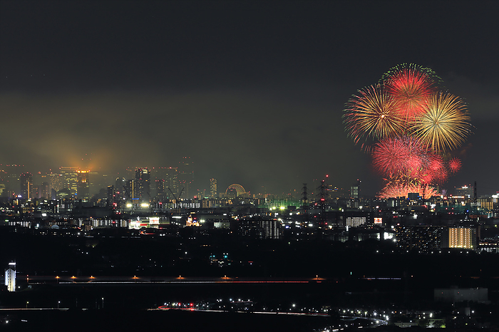 Naniwa Yodogawa Fireworks Festival and Umeda skyscrapers viewed from Kyoto City