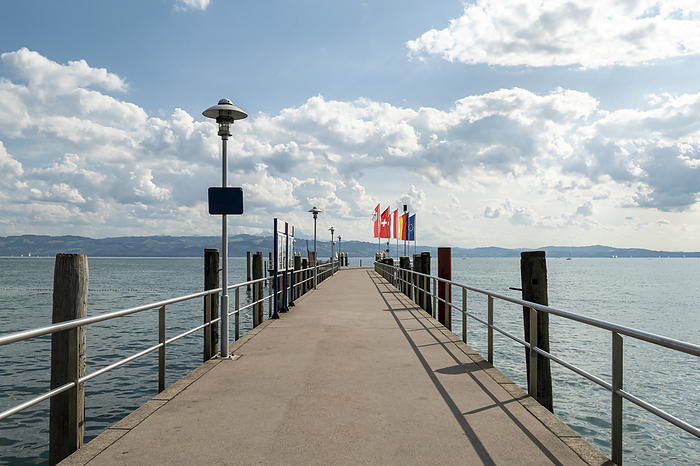 Lake Constance with flag and pier, Germany and pier, Germany Lake Constance with flag and pier, Germany and pier, Germany