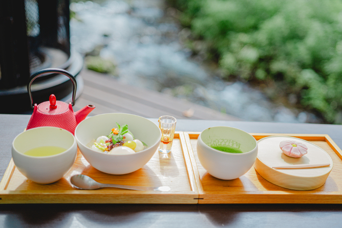 Japanese sweets and green powdered tea served at a riverside cafe