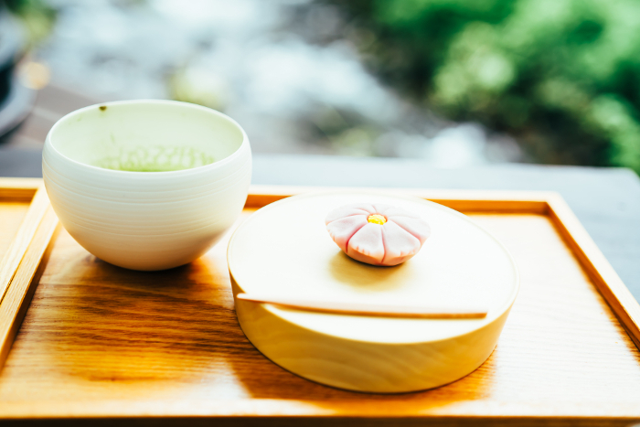 Japanese sweets and green powdered tea served at a riverside cafe