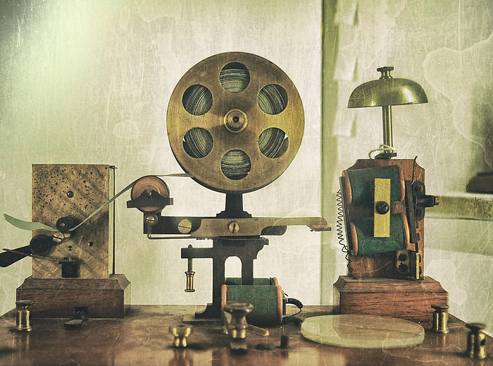 vintage effect image of an old morse code telegraph machine with bell and brass printer vintage effect image of an old morse code telegraph machine with bell and brass printer