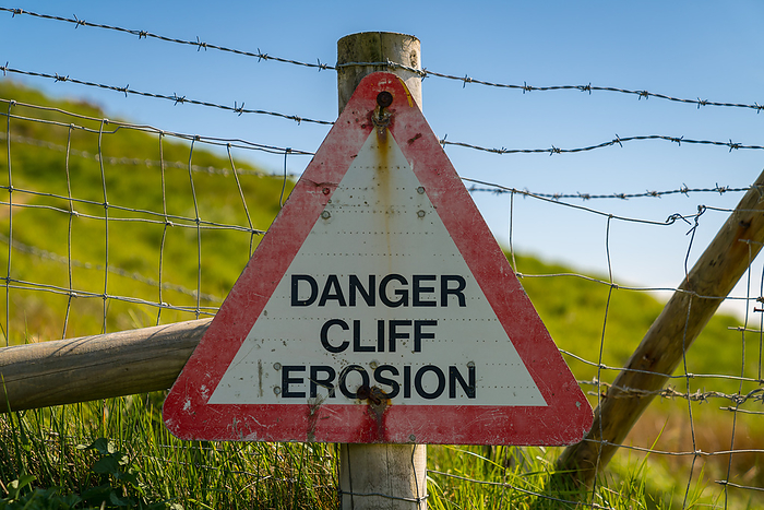 Sign: Danger cliff erosion Sign: Danger cliff erosion