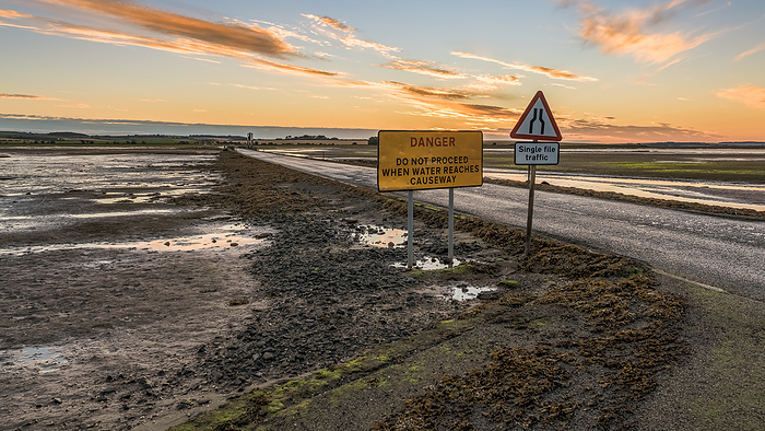 Sign: Single File Traffic, Danger do not proceed when water reaches causeway Sign: Single File Traffic, Danger do not proceed when water reaches causeway