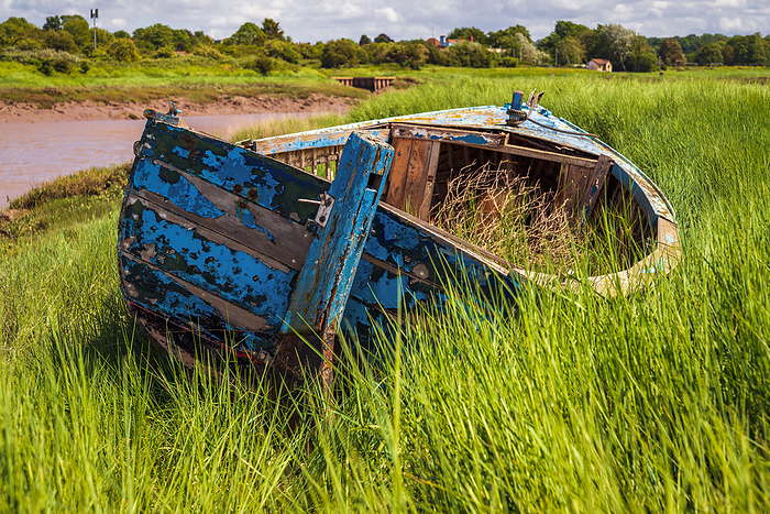 A decayed boat in the Pill Foreshore in Pill, North Somerset, England A decayed boat in the Pill Foreshore in Pill, North Somerset, England