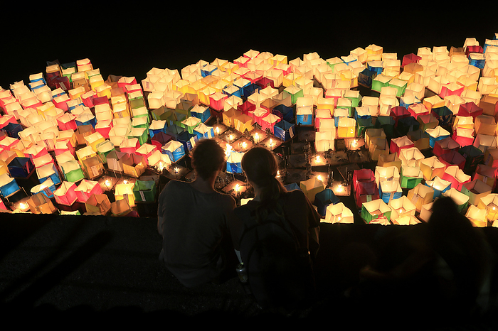 Foreigners watching the Obon lantern floating ceremony, Kyoto Pref.