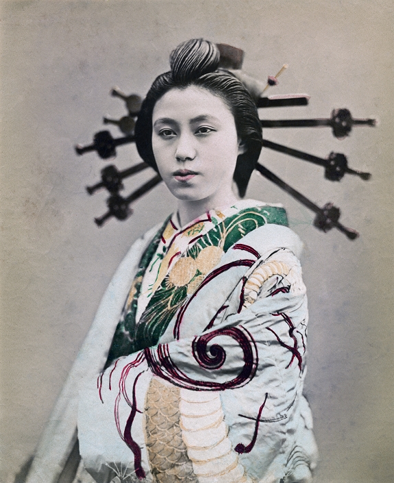 Oiran  1870s  An Oiran  high class prostitute , in her gorgeous kimono, of the Yukaku  red light district  of Yoshiwara in Tokyo. Meiji 1870s