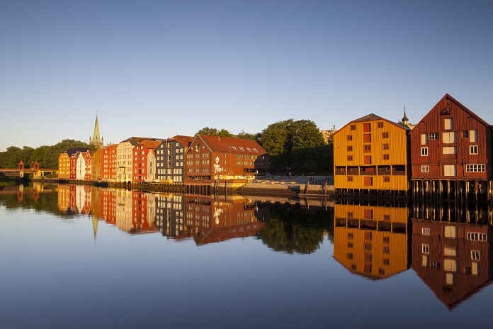 Norway Old fishing warehouses reflected in the River Nidelva, Trondheim, Sor Trondelag, Norway, Scandinavia, Europe