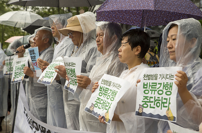 Protest in Seoul against Japan to release treated radioactive water from Fukushima plant Protest against Japanese government, Aug 23, 2023 : Kang Sung Hee  5th R , a lawmaker of the minor progressive Jinbo Party and activists from various civic groups participate in a protest to denounce Japan s decision to discharge nuclear contaminated water from the crippled Fukushima nuclear power plant into the Pacific Ocean, in front of the Japanese embassy in Seoul, South Korea. Pickets read,  Japanese Prime Minister Fumio  Kishida who will be punished by Heaven, stop the enforcement of the release of nuclear contaminated water  .  Photo by Lee Jae Won AFLO   SOUTH KOREA 