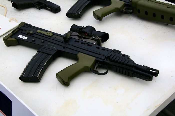 The L85A1 assault rifle uses a bullpup system and the firing mechanism is moved to the tail section... The L85A1 is a compact assault rifle.