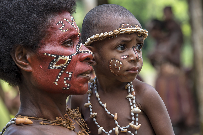Woman and child living along the Karawari River in the Sepik area of Papua New Guinea; Sepik, Papua New Guinea, by Karen Kasmauski / Design Pics