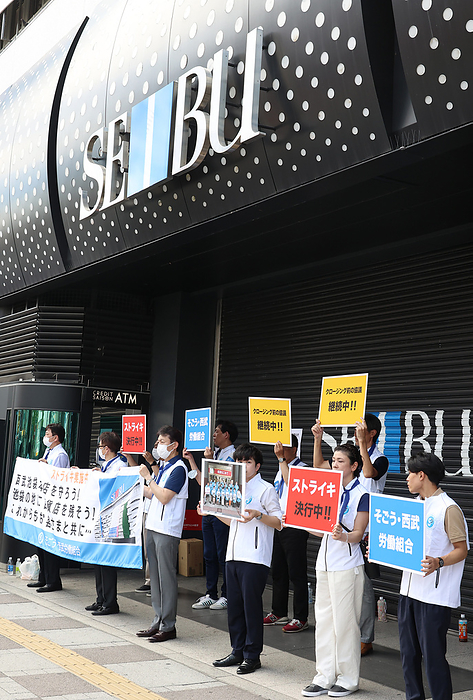 Labor union members of the Seibu department store are on a strike August 31, 2023, Tokyo, Japan   Labor union members of the Seibu department store hold placards and a banner as they are on a strike at the flagship store of the Seibu department store in Tokyo on Thursday, August 31, 2023. Seven and i Holdings, parent company of the Sogo and Seibu department stores decided to sell its department store chain to an American investment fund.    photo by Yoshio Tsunoda AFLO 