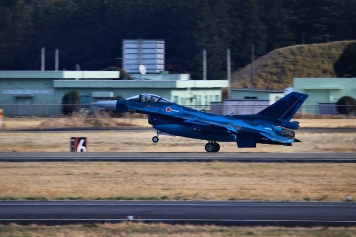 F-2 jet fighter flying high over the Hyakuri Air Base, a key air defense base in the capital of Japan