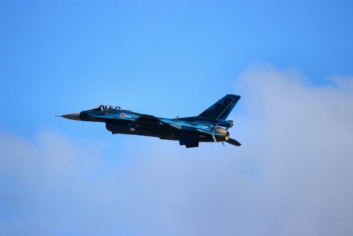 F-2 jet fighter flying high over the Hyakuri Air Base, a key air defense base in the capital of Japan