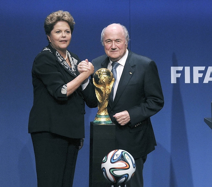 FIFA press conference  L R  Joseph Blatter, Dilma Rousseff, JANUARY 23, 2014   Football   Soccer : Brazil s President Dilma Rousseff  L  shakes hands with FIFA president Joseph Blatter during a press conference at the FIFA headquarters in Zurich, Switzerland.  Photo by AFLO 