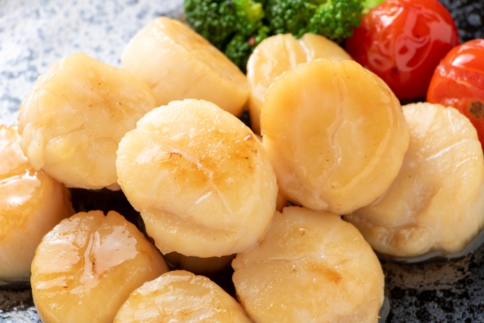 Scallops baked in butter.