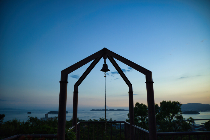 Sunset sky and bells viewed from Lovers Hill in Gamagori, Aichi Prefecture
